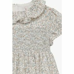 Trotters London Blue Ditsy Emma Floral Smocked Dress 3 Trotters London Blue Ditsy Emma Floral Smocked Dress -Trotters London store unnamed file 124